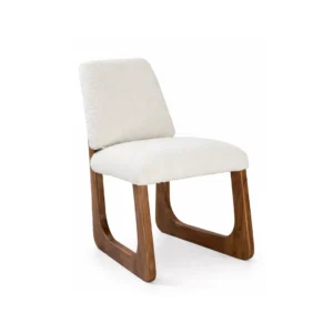 Upholstered dining chair Mavis with sculpted solid wood frame and soft textured fabric for modern interiors